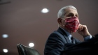 Anthony Fauci, director of the National Institute of Allergy and Infectious Diseases, wears a Washington Nationals protective mask while listening during a Senate Health, Education, Labor and Pensions Committee hearing in Washington, D.C., U.S., on Tuesday, June 30, 2020. 