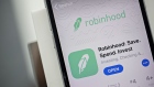 The Robinhood application is displayed in the App Store on an Apple Inc. iPhone in an arranged photograph taken in Washington, D.C., U.S., on Friday, Dec. 14, 2018. The Securities Investor Protection Corp. said a new checking account from Robinhood Financial LLC raises red flags and that the deposited funds may not be eligible for protection.