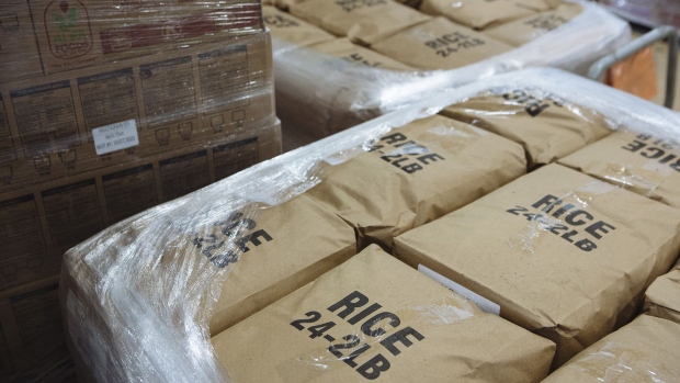 Bags of rice sit stacked on pallets at a Feeding Westchester food bank distribution center in Elmsford, New York, U.S., on Monday, March 16, 2020. 