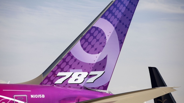 The tail fin of a Boeing Co. 787-9 Dreamliner aircraft sits on display during the first day of the 16th Dubai Air Show at Dubai World Central (DWC) in Dubai, United Arab Emirates, on Sunday, Nov. 17, 2019. The Dubai Air Show is the biggest aerospace event in the Middle East, Asia and Africa and runs Nov. 17 - 21. Photographer: Christopher Pike/Bloomberg