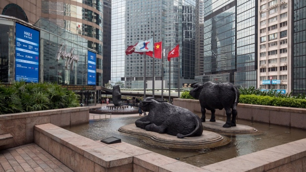 Sculptures of water buffaloes stand outside the Exchange Square complex, which houses the Hong Kong Stock Exchange, in Hong Kong, China, on Monday, Sept. 16, 2019. The Hong Kong bourse's unsolicited takeover bid for the London Stock Exchange Group Plc was greeted with a scathing rejection and the exchange suffered a further humiliation when China praised the rebuff as well.