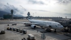 An Airbus A330 aircraft operated by Cathay Pacific Airways Ltd. stands at Hong Kong International Airport in Hong Kong, China, on Tuesday, March 5, 2019. Cathay is in talks to buy shares in Hong Kong’s only budget airline Hong Kong Express Ltd. from Chinese conglomerate HNA Group Co., as Asia’s biggest international carrier seeks to gain a foothold in the region’s booming low-cost travel market. Photographer: Paul Yeung/Bloomberg