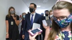 Steven Mnuchin, center, wears a protective mask following the Senate Republican policy luncheon on Capitol Hill in Washington, D.C. on July 21. Photographer: Stefani Reynolds/Bloomberg