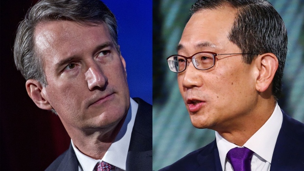 Carlyle Group LP Co-Chief Executive Officers Kewsong Lee, right, and Glenn Youngkin. Source:Bloomberg
