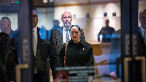Meng Wanzhou, chief financial officer of Huawei Technologies Co., exits the Supreme Court after an extradition hearing in Vancouver, British Columbia, Canada, on Thursday, Jan. 23, 2020. The first round of extradition hearings for Wanzhou finished on Thursday with no immediate ruling.