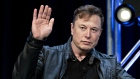 Elon Musk, founder of SpaceX and chief executive officer of Tesla Inc., waves while arriving to a discussion at the Satellite 2020 Conference in Washington, D.C., U.S., on Monday, March 9, 2020. The event comprises important topics facing both satellite industry and end-users, and brings together a diverse group of thought leaders to share their knowledge.