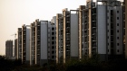 Residential buildings stand in Noida, Uttar Pradesh, India, on Saturday, June 6, 2020. India's capital region set to be the latest place in India to be overwhelmed by Covid-19, and the worst may be yet to come. As hospitals become overwhelmed, some private housing complexes are trying to fill in the gaps for residents by turning their club houses into quarantine centers. Photographer: Anindito Mukherjee/Bloomberg