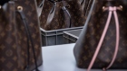 Louis Vuitton luxury hangbags sit after manufacture at the workshop in Beaulieu-sur-Layon, France.