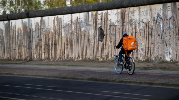 A Delivery Hero SE food delivery cyclist in Berlin.