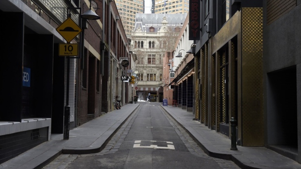 Crossley Lane is deserted in Melbourne, Australia, on Thursday, July 16, 2020. Victoria state last week enforced a six-week lockdown after health authorities identified breaches in hotel quarantine procedures as the catalyst for outbreaks. An additional 1,000 defense force personnel will be sent to Victoria over the next three to four weeks to free up the state’s emergency services workers and allow them to self-isolate if they’re exposed to the coronavirus. Photographer: Carla Gottgens/Bloomberg