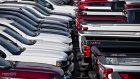 General Motors Co. Chevrolet Silverado trucks are displayed at a car dealership in Tinley Park, Illinois.
