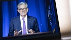 Jerome Powell, chairman of the U.S. Federal Reserve, speaks during a virtual news conference seen on a laptop computer in Arlington, Virginia, U.S., on Wednesday, July 29, 2020. Federal Reserve officials left their benchmark interest rate unchanged near zero and again vowed to use all their tools to support the U.S. economy amid a shaky recovery from the coronavirus pandemic.