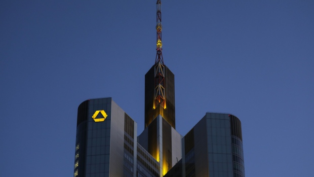 The Commerzbank AG logo sits illuminated on the bank's headquarters at night in Frankfurt, Germany, on Monday, June 29, 2020. Commerzbank has canceled an extraordinary meeting of the supervisory board at the request of labor representatives, people familiar with the matter said. Photographer: Alex Kraus/Bloomberg