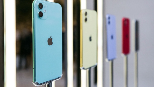 Different colored Apple Inc. iPhone 11 smartphones stand on display inside the Regent Street Apple store during a product launch event in London, U.K., on Friday, Sept. 20, 2019. Apple's new iPhones with camera enhancements and improved battery life go on sale today. Photographer: Chris Ratcliffe/Bloomberg