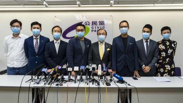 From left, Gordon Lam, Jeremy Tam, Kwok Ka-ki, Alvin Yeung, Alan Leong, Dennis Kwok, Tat Cheng, Tanya Chan, members of the Civic Party, attend a news conference in Hong Kong, China, on Thursday, July 30, 2020. Hong Kong's government barred 12 pro-democracy activists including Joshua Wong from running in September's Legislative Council election and said more could be disqualified, confirming fears that officials would use a new security law to deny them the chance to achieve a legislative majority.