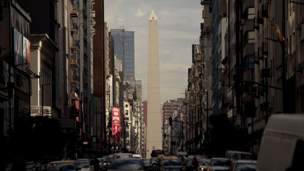 Traffic passes by the Obelisk of Buenos Aires in Buenos Aires, Argentina, on Friday, June 19, 2020.