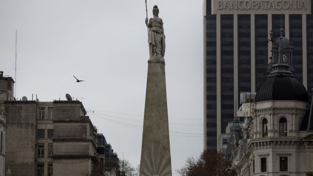 A statue stands over the Plaza de Mayo, marking the scene of the May 25, 1810 revolution, in Buenos Aires, Argentina.