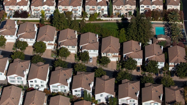 Houses stand in this aerial photograph taken near Cupertino, California. Photographer: Sam Hall/Bloomberg