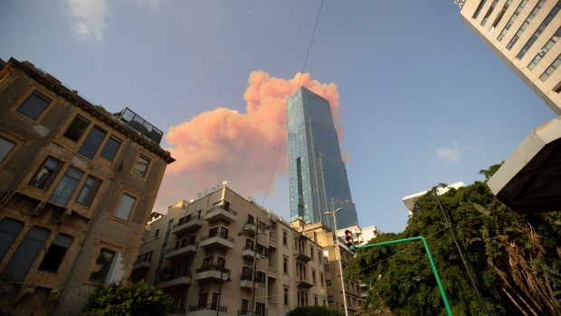 A cloud from a massive explosion is seen in in Beirut, Lebanon, Tuesday, Aug. 4, 2020.  
