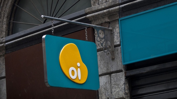 Oi SA signage is displayed outside of a retail store in Rio de Janeiro. Photographer: Dado Galdieri/Bloomberg