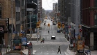 Pedestrians cross a nearly empty street in Ottawa, Ontario, Canada, on Wednesday, April 29, 2020. Prime Minister Trudeau said that the government will do what's needed to protect supply chains.