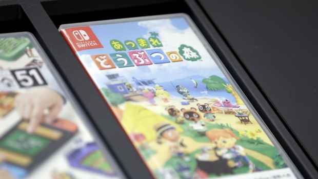 A packaging case for Nintendo Co.'s video game Animal Crossing: New Horizons for the Switch console sits on display inside the Nintendo TOKYO store in Tokyo, Japan, on Tuesday, Aug. 4, 2020. Nintendo is scheduled to report first-quarter earnings figures on Aug. 6.