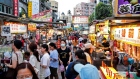 People shop at food stalls at the Ningxia Night Market in Taipei, Taiwan, on Thursday, July 30, 2020. 