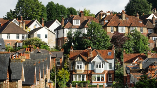 Residential properties stand in Guildford, U.K., on Friday, June 12, 2020. U.K. house prices fell the most in more than a decade and consumer borrowing plunged as the coronavirus lockdown shuttered the economy.