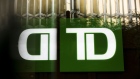 Toronto-Dominion (TD) Canada Trust signage is reflected on a building in the financial district of Toronto, Ontario, Canada, on Thursday, July 25, 2019. Canadian stocks fell as tech heavyweight Shopify Inc. weighed on the benchmark and investors continued to flee pot companies. Photographer: Brent Lewin/Bloomberg