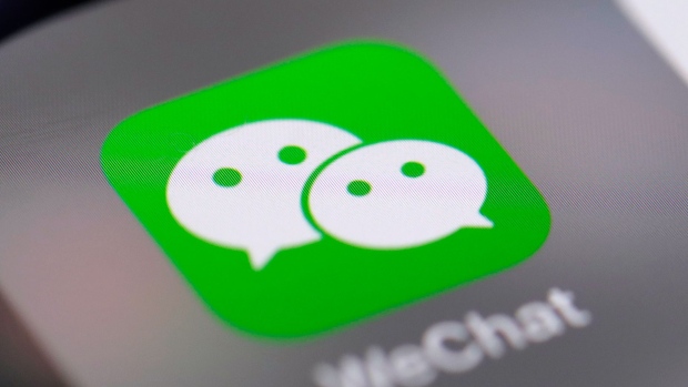 Icons for the Tencent Holdings Ltd. messaging applications QQ, left, and WeChat are seen in this arranged photograph taken in Hong Kong, China, on Thursday, Oct. 12, 2017.