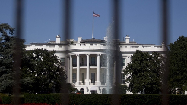 The south side of the White House stands past a fence in Washington, D.C.