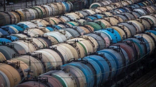 Rail wagons for oil, fuel and liquefied gas cargo stand in sidings at Yanichkino railway station, cose to the Gazprom Neft PJSC Moscow refinery in Moscow, Russia, on Monday, April 27, 2020. Oil prices plunged to within a whisker of $10 a barrel after a major index tracked by billions of dollars in funds bailed out of near-term contracts for fear prices may turn negative again. Photographer: Andrey Rudakov/Bloomberg