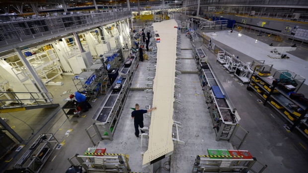 A wing stands in a bay on the Airbus SE A350 wing production line at the Airbus SE assembly factory in Broughton, U.K., on Monday, Jan. 16, 2017. Airlines are turning to twin-engine planes like Airbus's A350 and Boeing Co.'s 787 Dreamliner for long routes.