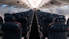ARLINGTON, VA - JULY 22: An empty aircraft is seen during a aircraft disinfecting demonstration during a media preview at the Ronald Reagan National Airport on July 22, 2020 in Arlington, Virginia. During the COVID-19 pandemic, all employees and passengers are required to wear facemasks while onboard a Delta plane. (Photo by Michael A. McCoy/Getty Images)