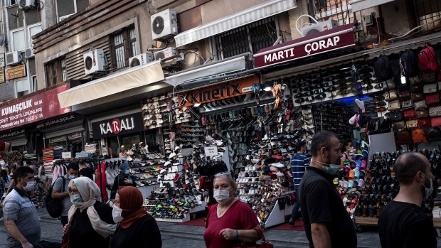 ISTANBUL, TURKEY - AUGUST 07: People shop in a market street on July 07, 2020 in Istanbul, Turkey. The Turkish Lira continued to slide Friday after posting record lows against the US dollar during the week. (Photo by Chris McGrath/Getty Images)