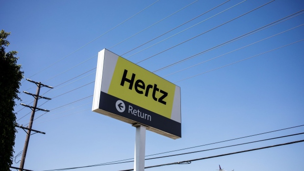 Signage is displayed outside of a Hertz Global Holdings Inc. rental location at Los Angeles International Airport (LAX) in Los Angeles, California, U.S., on Friday, Aug. 2, 2019. Hertz is scheduled to release earnings figures on August 6. Photographer: Martina Albertazzi /Bloomberg