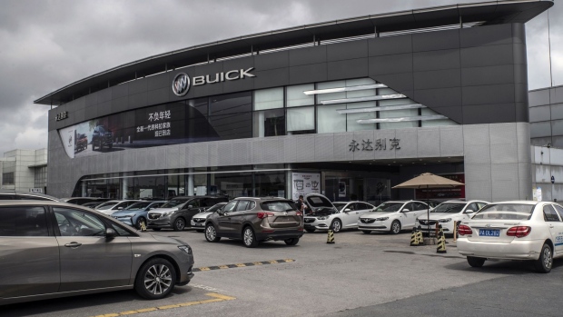 A General Motors Co. Buick Velite 6 electric vehicle (EV) is displayed at the company's dealership in Shanghai, China, on Thursday, July 18, 2019. The future for GM in China is in the hands of customers considering whether to go electric. No other country comes close to China, in terms of scale and adoption of new-energy vehicles, where more electric cars have been sold in Shanghai alone than in all of the U.S., U.K., or Germany. Photographer: Gilles Sabrie/Bloomberg