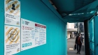 Hand hygiene signs are displayed at a construction site in Wellington, New Zealand, on Wednesday, July 29, 2020. 
