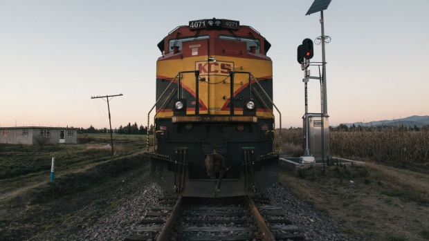 A Kansas City Southern freight train is halted by a teachers' union strike near the town of Maravatio, Michoacan state, Mexico, on Tuesday, Jan. 29, 2019. Teachers' protests in the central state of Michoacan in Mexico have virtually detained all shipping by railroad in some parts of the country. Eleven days of protests have led to two hundred halted trains, Ferrocarril Mexicano SA spokeswoman Lourdes Aranda said.