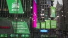 iQiyi.com signage is displayed on monitors outside the Nasdaq MarketSite during the company's initial public offering (IPO) in New York, U.S., on Thursday, March, 29, 2018. Shares in iQiyi Inc., a Chinese Netflix-style video streaming service controlled by search giant Baidu Inc., fell slightly in their trading debut after the company raised $2.25 billion in a U.S. initial public offering. Photographer: Victor J. Blue/Bloomberg