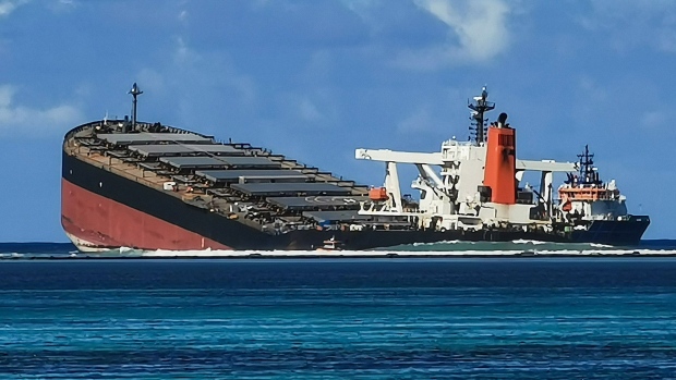 (EDITORS NOTE: Best quality available.) The MV Wakashio bulk carrier vessel, operated by Mitsui OSK Lines Ltd., sits partially submerged in the ocean after running aground close to Pointe d'Esny, Mauritius, on Friday, Aug. 14, 2020. The MV Wakashio leaked at least 1,000 tons of black sludge into the turquoise waters off the Indian Ocean island’s southeastern coast after it ran aground on July 25. Photographer: Kamlesh Bhuckory/Bloomberg