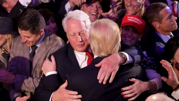 Robert Trump hugs Donald Trump in 2016.