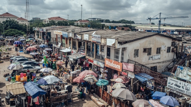 Stalls selling textiles, consumer goods and electronics line an area of Utako Ultra Modern market in Abuja, Nigeria on June 3.