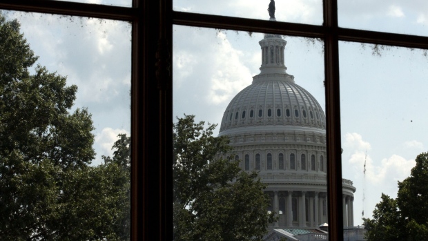 The U.S. Capitol is seen from the Russell Senate Office Building in Washington, D.C., U.S., on Tuesday, Aug. 11, 2020. President Donald Trump's weekend set of executive actions aimed at shoring up the U.S. economy while stimulus talks remain stalled in Congress seems to have done little to add urgency to the negotiations.