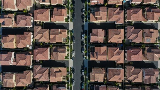 Homes stand in a planned residential community in this aerial photograph taken over Irvine, California, U.S., on Wednesday, May 6, 2020. Mounting economic fallout from the pandemic is fueling apartment landlords' concerns that more tenants will struggle to make their rent payments, even after most managed to come up with the money for April. Photographer: Bing Guan/Bloomberg