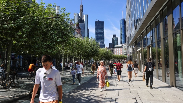 Shoppers pass along Zeil Strasse retail high street in Frankfurt, Germany, on Wednesday, Aug. 19, 2020. Germany recorded the highest number of new coronavirus cases in nearly four months, fueling fears about a resurgence of infections across Europe.