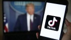 The TikTok logo is displayed in the app store in this arranged photograph in view of a video feed of U.S. President Donald Trump in London, U.K., on Monday, Aug. 3, 2020. TikTok has become a flash point among rising U.S.-China tensions in recent months as U.S. politicians raised concerns that parent company ByteDance Ltd. could be compelled to hand over American users’ data to Beijing or use the app to influence the 165 million Americans, and more than 2 billion users globally, who have downloaded it. Photographer: Hollie Adams/Bloomberg