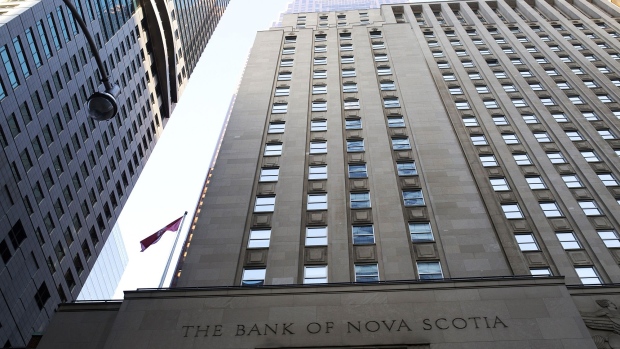 The Bank of Nova Scotia stands in the financial district of Toronto, Ontario, Canada, on Friday, Feb. 21, 2020. Canadian stocks declined with global markets, as authorities struggled to keep the coronavirus from spreading more widely outside China. However, investors flocking to safe havens such as gold offset the sell-off in Canada's stock market.