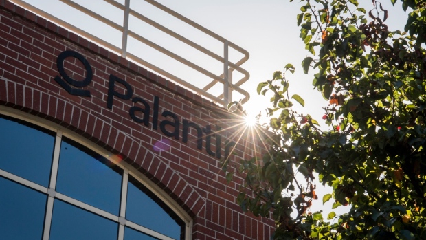 Palantir Technologies Inc. signage is displayed outside the company's headquarters in Palo Alto, California, U.S., on Tuesday, Nov. 5, 2019. BP Plc, one of the world's biggest oil and gas companies, is a shareholder in secretive U.S. data-mining firm Palantir Technologies Inc., the Sunday Times reported. Photographer: David Paul Morris/Bloomberg