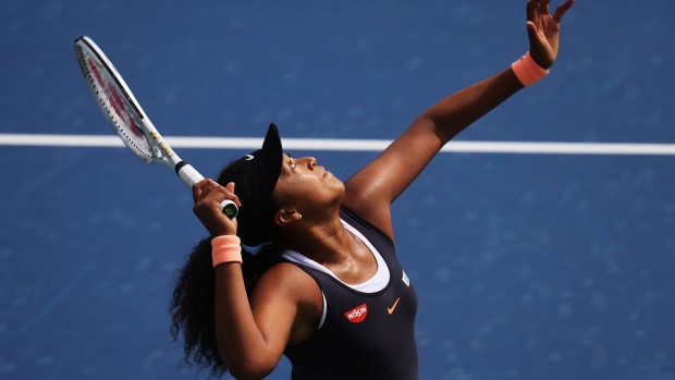 NEW YORK, NEW YORK - AUGUST 26: Naomi Osaka of Japan serves against Anett Kontaveit of Estonia during the Western & Southern Open at the USTA Billie Jean King National Tennis Center on August 26, 2020 in New York City. (Photo by Al Bello/Getty Images)
